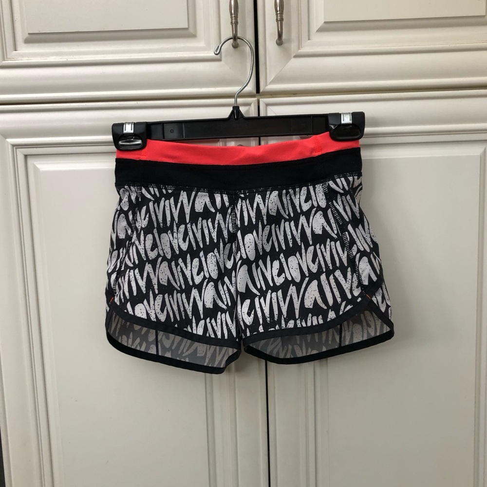 Ivivva by Lululemon girls lined branded print athletic shorts
